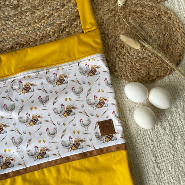 Hanging waterproof bag | A hen and her eggs