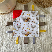 Crunchy comforter with teething corner | A hen and her eggs